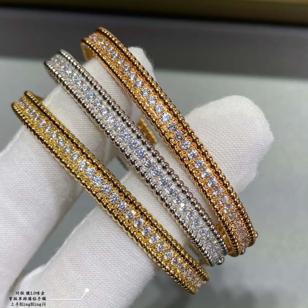 Van Cleef & Arpels Silver Diamante Flower Bangle Set